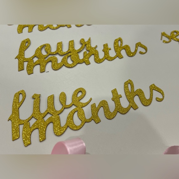First year banner. Gold sparkling word birthday decorations banner pink ribbons - Picture 2 of 3